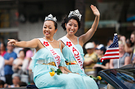 Miss Cherry Blossom's Queen and Princess, representing the Japanese American community of Hawaii, waved to the crowd.