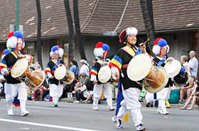 The rhythmical beating of the drums is a big part of Korea's traditional folk music.