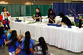 Students show interest in the art of Ikebana. Each flower, each branch is carefully arranged with much thought and grace.