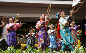 Nihon Nankin-Tamasudare Association perform traditional Japanese street entertainment.