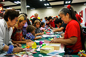 Origami lessons were enjoyed by both the children and the adults.