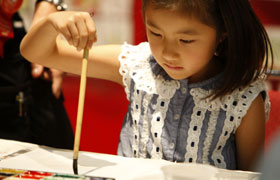 Etegami booth. Children and adults eagerly created their own Etegami.