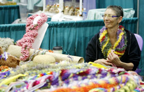 This Hawaii booth sold ribbon leis. The colorful ribbon leis were enjoyed by many visitors.