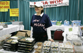 The Korean food booth Miga Won, their restaurant is right across the Hawaii Convention Center. Lots of bento!