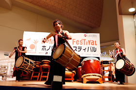 Taiko KOZO performs to the pleasure of the audience. They various types and sizes of wadaiko.