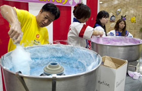 The staff work hard for the children. The cotton candy was once again popular this year.