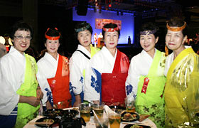 Members of the Luna Party from Kanagawa Prefecture's Hiratsuka Tanabata Matsuri dressed in their colorful costumes.