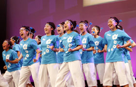 The Sonoda Gakuen High School girls brought energy and excitement to Hawaii. Their colorful costumes brightened the stage once again.