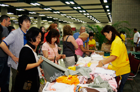 Folks purchased the official Honolulu Festival T-shirts as well as other logo items.