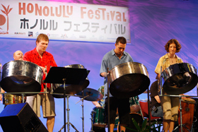 The Global Drums-Pangea from Canada excites the audience with their steel drum performance.