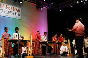 The members of Hawaii's Filcom Banda Kawayan play gentle and natural sounds on their traditional Filipino bamboo musical instruments.