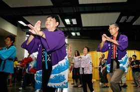 Members of a local Bon Dance Club show their moves.