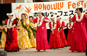 Aloha Diamonds dance in their colorful costumes.They always do much better dancing hula at the Honolulu Festival than at their practices!