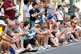 Crowds gather from one end of Waikiki to the other. Lots of smiles and cheers.