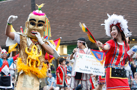 The colors and brilliance of the performers from Taiwan stand out among the crowd.