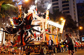 The fire bell heard throughout Waikiki announced the coming of Hawaii's own mikoshi, Honolulu Daijayama.