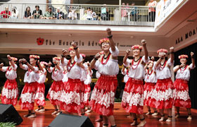 The Obama Girls danced with ease. The sun shined on stage and the ladies had big smiles on their faces.