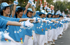 The perfect unison of the Sonoda Gakuen High School dancers. They created a sea of blue down Kalakaua Avenue with their bright costumes.