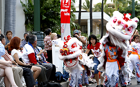 The members of the Lion Dance approach the crowd, always a popular entry.