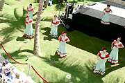 Hula dancers on the green lawn