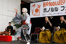 Shamisen performance by Toyota Tsugaru-Shamisen Circle and Interchanging Hyottoko and Okame Mask Dance.