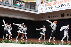 ASSESS, a cheerleading team from Inha University in Korea, perform with loud voices and great energy.