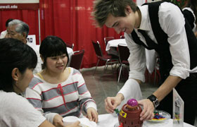 The butler played games with the guests.