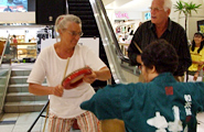 A spectator joyfully experiencing the taiko